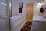 Master Bathroom with shower and jetted tub